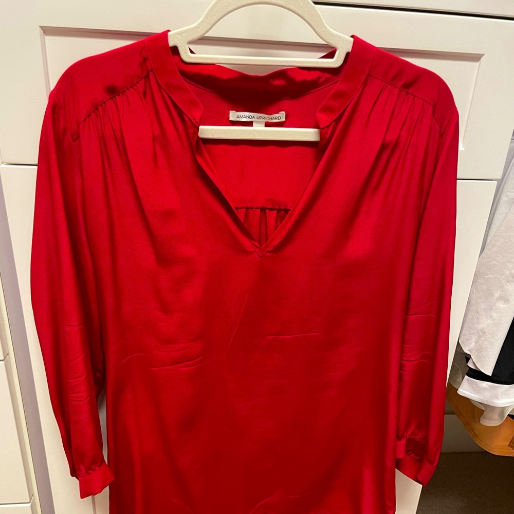 Rich red blouse. Perfect for work or a night out.